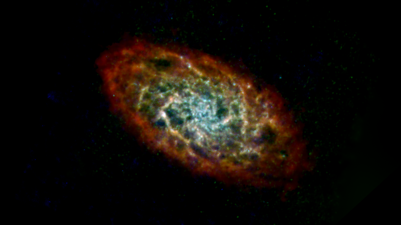 La galaxia Triangulum, o M33, se muestra aquí en longitudes de onda de luz de radio e infrarrojo lejano.