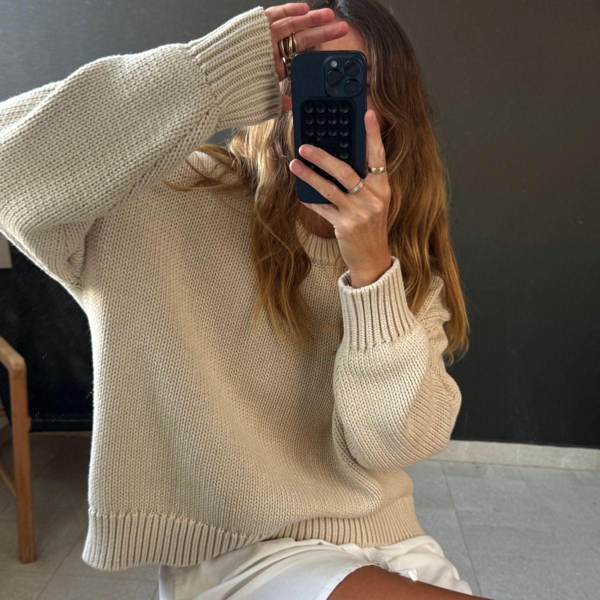 Angie wears a blouse and shorts from A.L.C 
