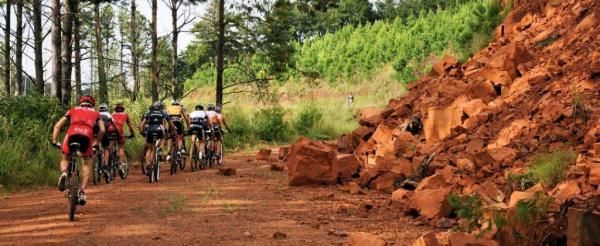 The racers pass a rockfall.