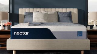 The Nectar Classic Memory Foam Mattress on a bed frame in a bedroom