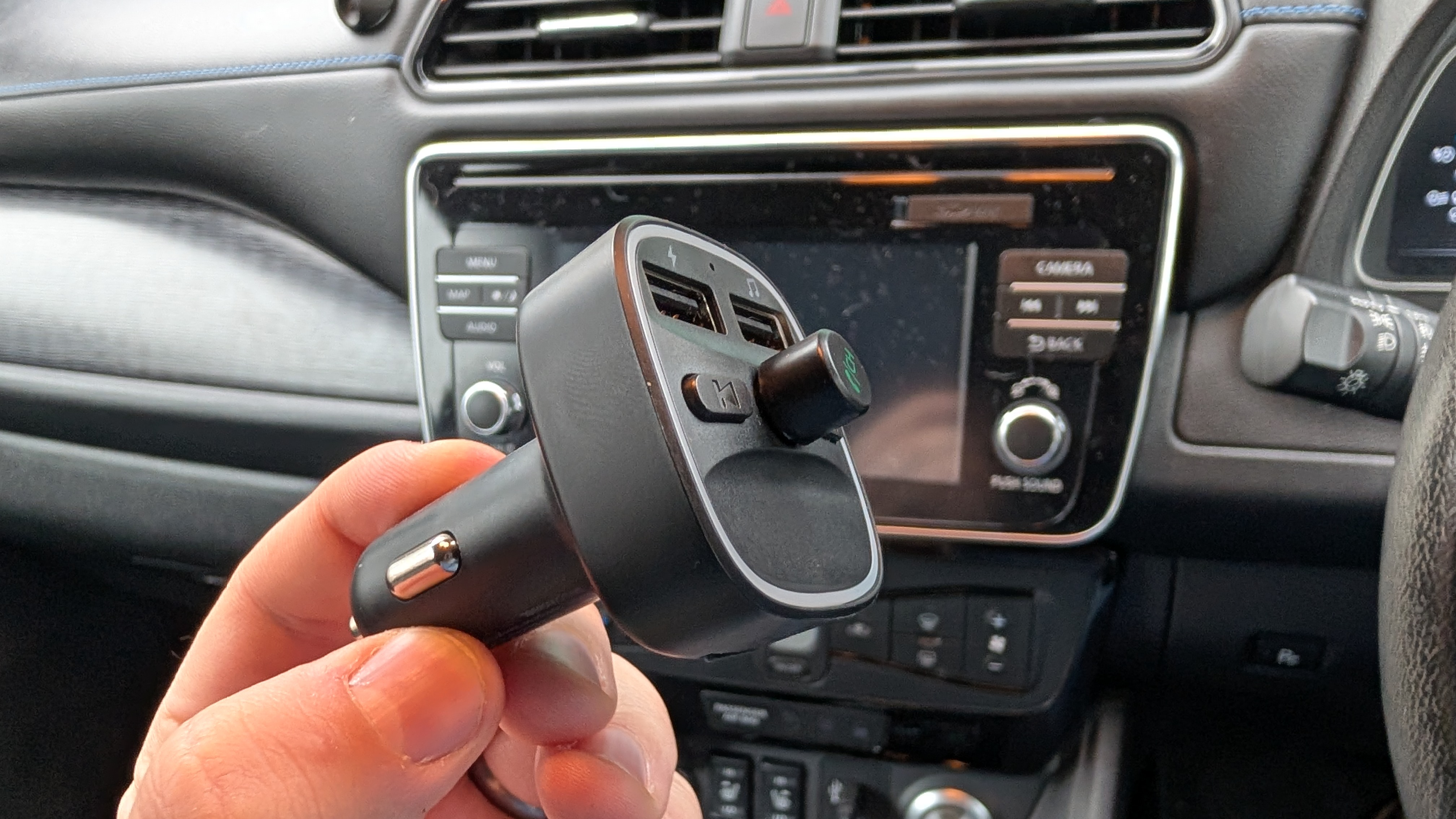 lencent fm transmitter inside a nissan leaf cockpit