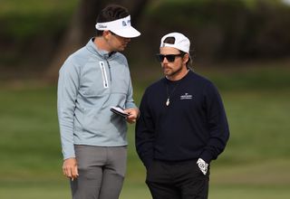 Hossler and Nelson chat on the 13th green during the AT&T Pebble Beach Pro-Am