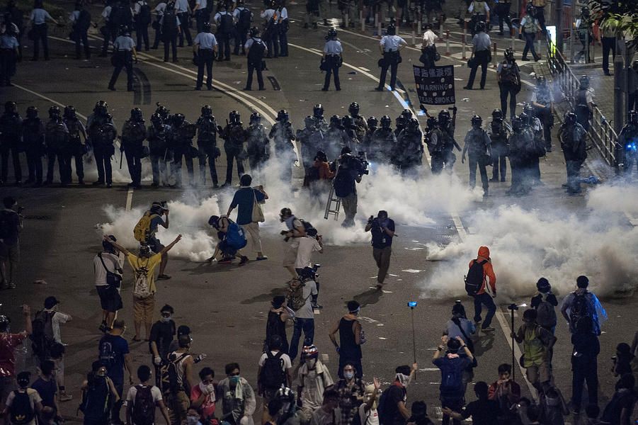 Hong Kong protesters defy police, expand pro-democracy protest