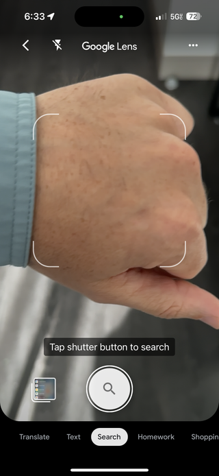 Photo mode in Google Lens capturing a photo of a hand
