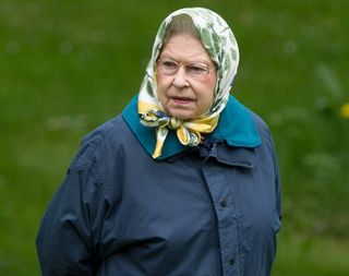Queen Elizabeth II walks in the grounds at Windsor Castle during The Royal Windsor Horse Show
