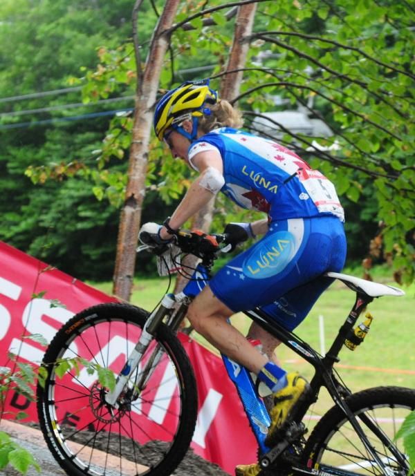 Mary McConneloug (Kenda-Seven-No Tubes) drinking on her way up the mountain