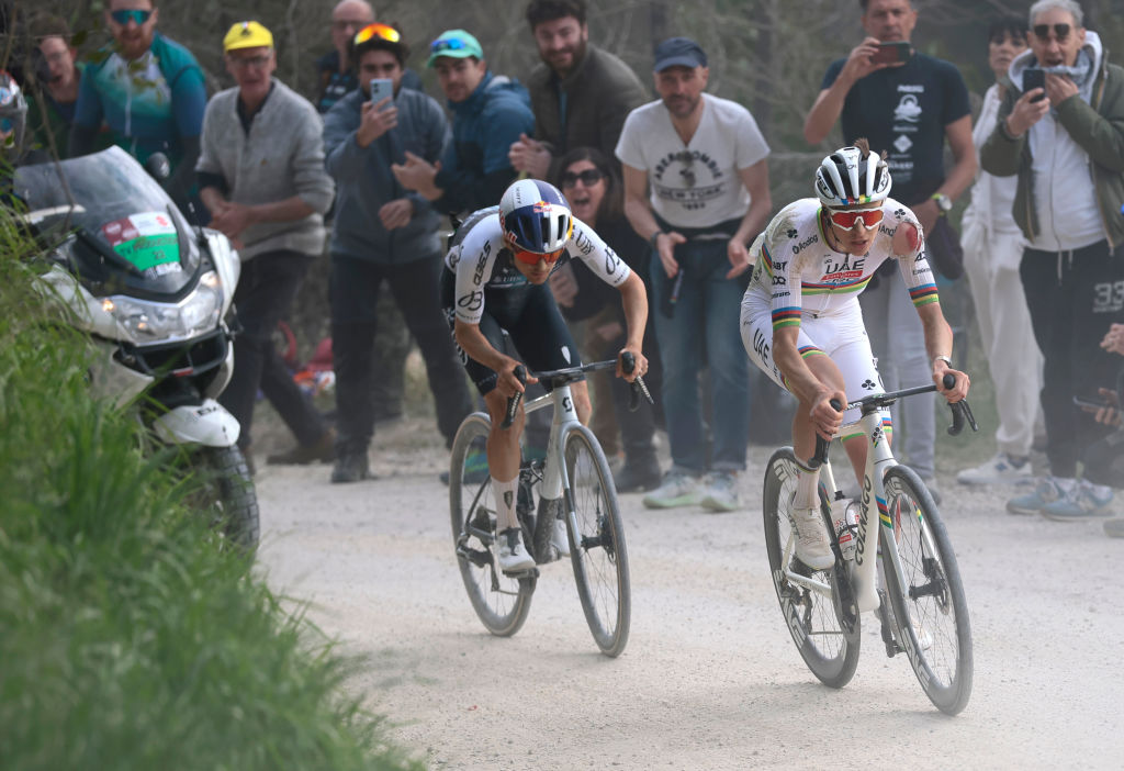 SIENA, ITALY - MARCH 08: (L-R) Tom Pidcock of The United Kingdom and Q36.5 Pro Cycling Team and Tadej Pogacar of Slovenia and UAE Team Emirates-XRG compete in the breakaway during the 19th Strade Bianche 2025, Men's Elite a 213km one day race from Siena to Siena 320m / #UCIWT / on March 08, 2025 in Siena, Italy. (Photo by Luca Bettini - Pool/Getty Images)