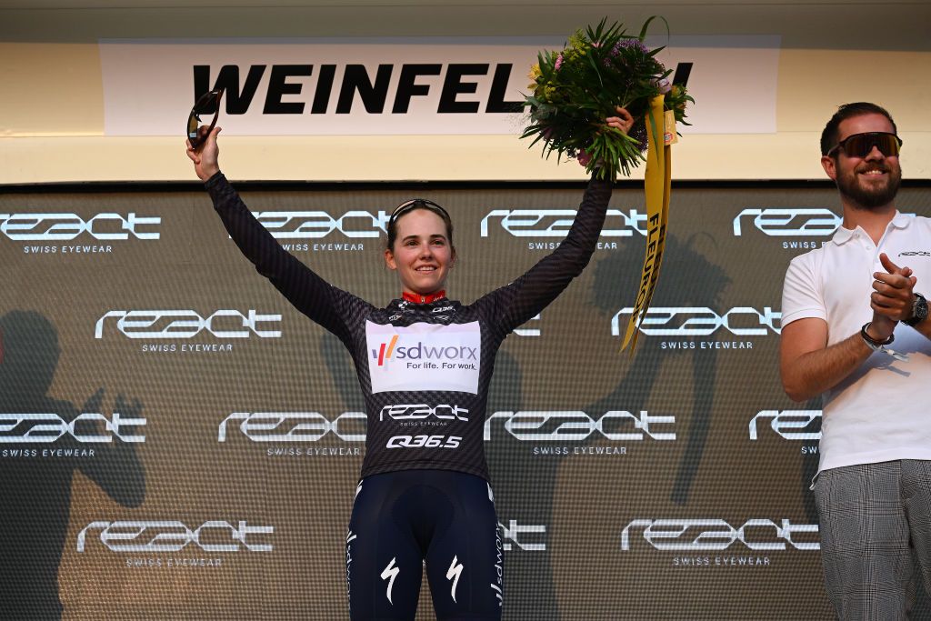 WEINFELDEN SWITZERLAND JUNE 17 Kata Blanka Vas of Hungary and Team SD Worx celebrates at podium as Black Points Jersey winner during the 3rd Tour de Suisse Women 2023 Stage 1 a 56km stage from Weinfelden to Weinfelden UCIWWT on June 17 2023 in Weinfelden Switzerland Photo by Dario BelingheriGetty Images