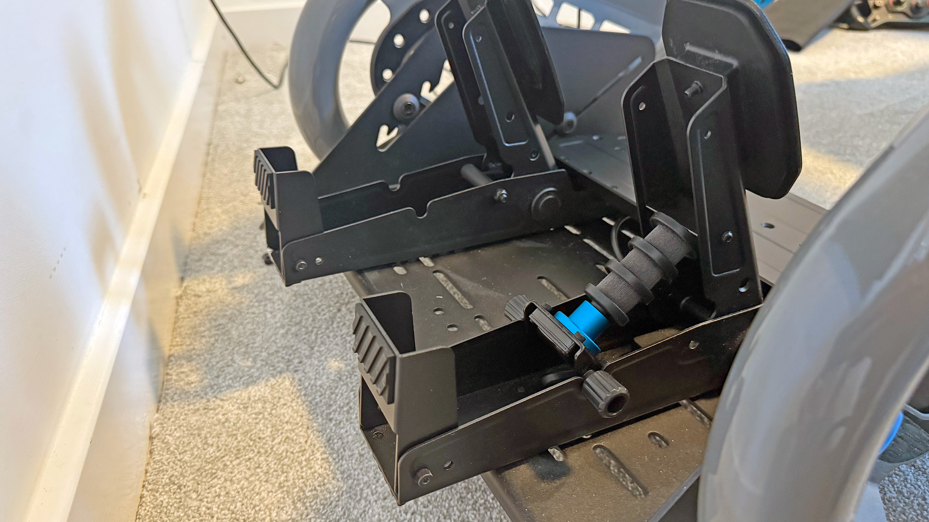 The Logitech G RS50 pedals from the side