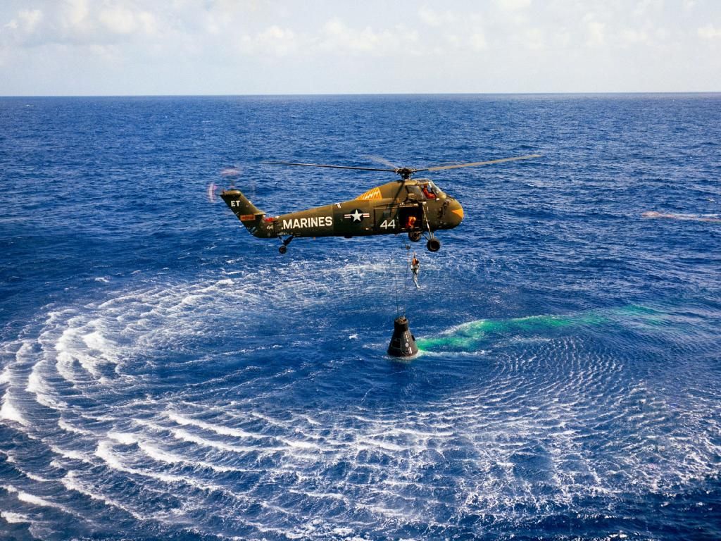 A Marine helicopter picks up Mercury astronaut Alan Shepard and his Freedom 7 capsule in the Atlantic Ocean after his first American sub-orbital flight on May 5, 1961. Engineers said the spacecraft was in such great shape it could be reused. Doctors said Shepard could be used again too.