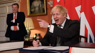 David Frost watches Boris Johnson sign the Brexit trade deal