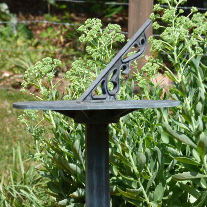 Sundial In The Garden