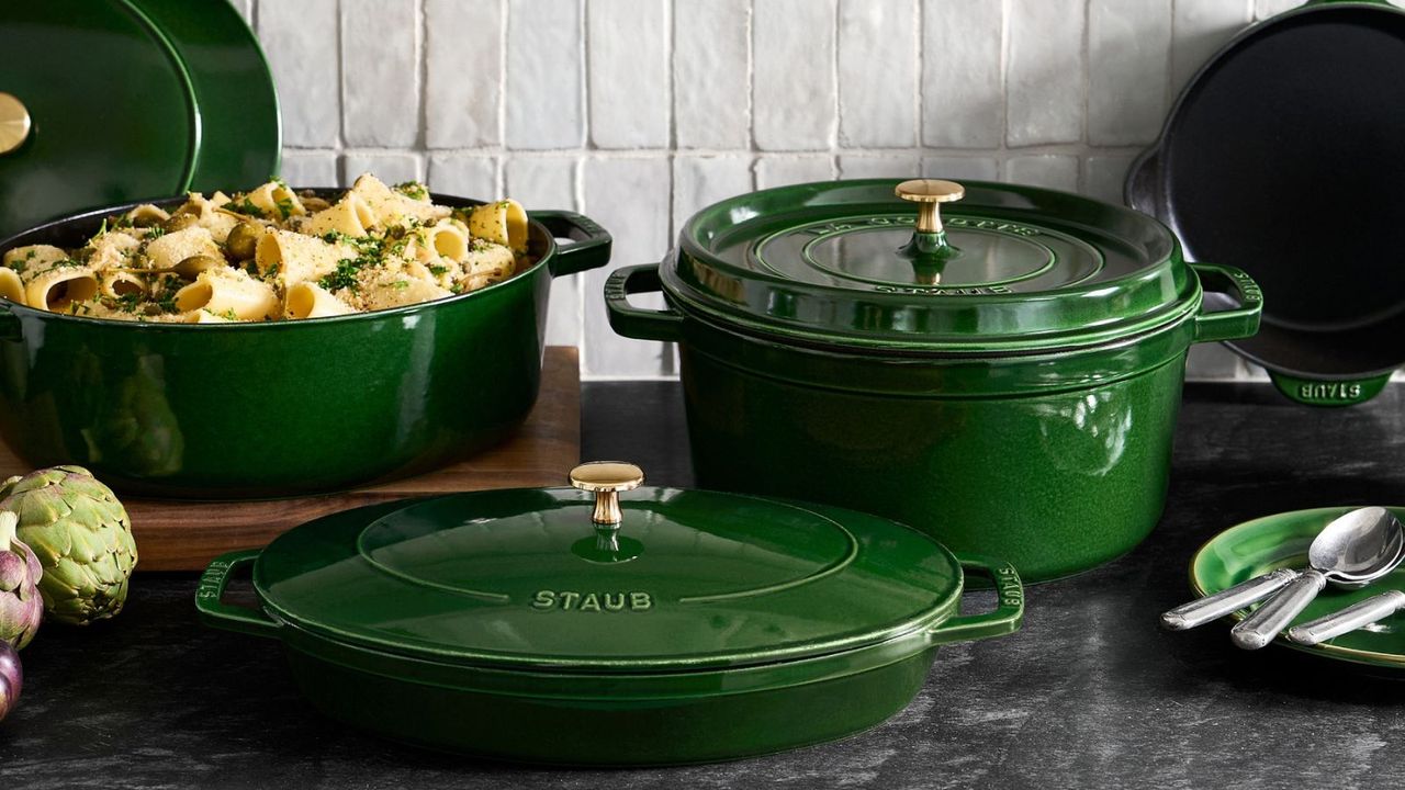 The best Dutch oven, Staub Enameled Cast Iron in Basil Green on a marble kitchen counter 