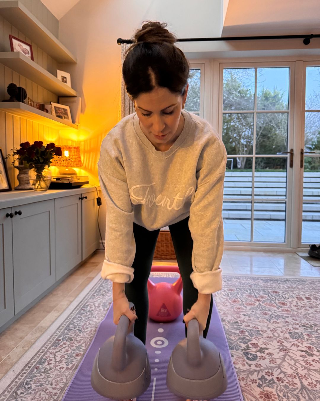 Health Writer Anna trying the 7-7-7 kettlebell workout