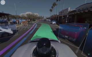 Waymo's AI color codes different objects based on what they are, and tracks people's potential movements to avoid collisions