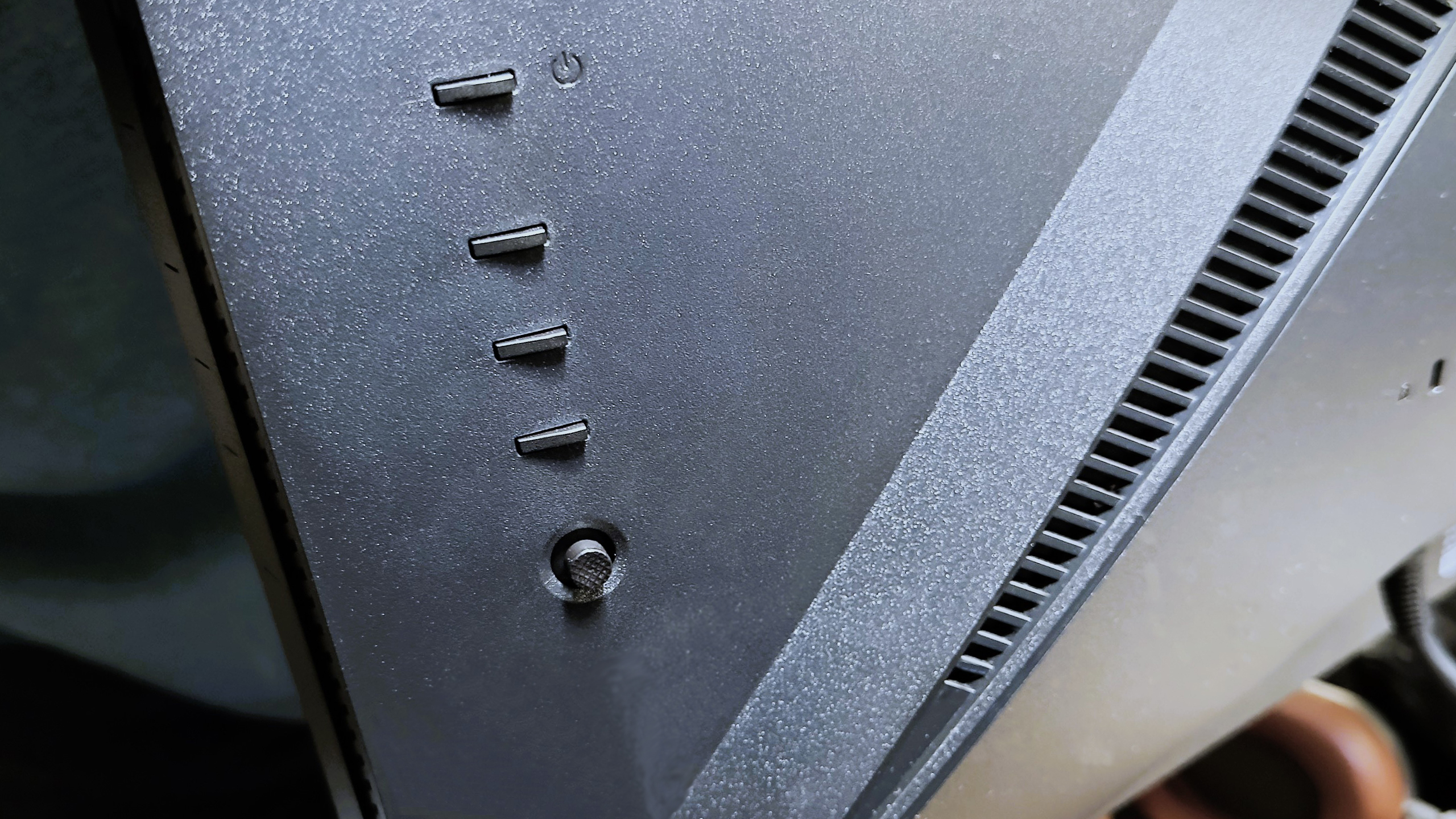 The Acer Predator X32 FP buttons.