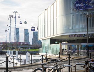 IFS cloud cable cars with DLR train and towers in background