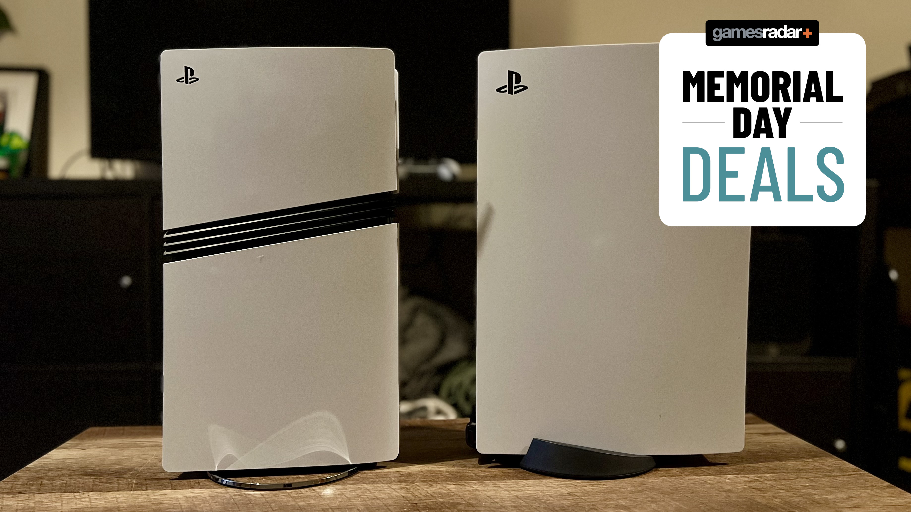 PS5 Pro and PS5 consoles on a wooden table with Memorial Day deals badge