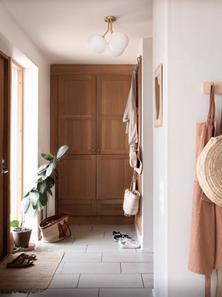 a hallway way with wooden doors
