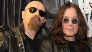 Rob Halford and Ozzy Osbourne standing side-by-side in 2010