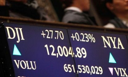The Dow Jones crossed over the 12,000 mark just hours after Obama called for lower corporate tax rates and other pro-business, deficit-cutting measures.