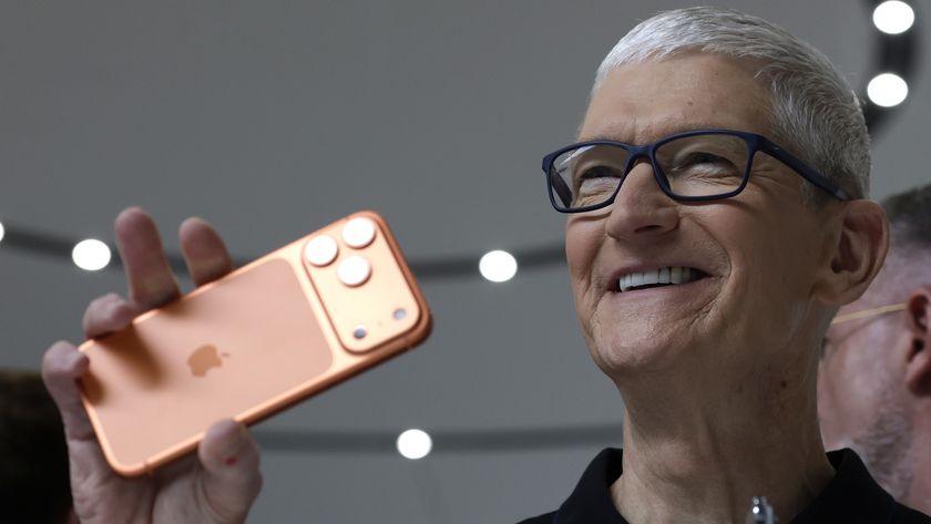 Tim Cook holding up an iPhone 17 Pro Max at launch event