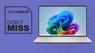 A Dell XPS 13 against a purple TechRadar DON'T MISS background