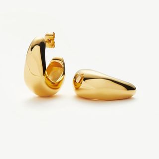 flat lay image of gold missoma hoops