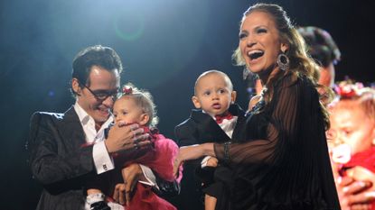 Marc Anthony, Jennifer Lopez and their kids Max and Emme on stage before he performs Valentine's Day show at Madison Square Garden on February 14, 2009 in New York City.