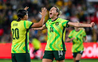 Alanna Kennedy of the Matildas celebrates after scoring her teams first goal with Sam Kerr of the Matildas during the International Friendly match between Australia Matildas and New Zealand Football Ferns at Coopers Stadium on December 02, 2025 in Adelaide, Australia.