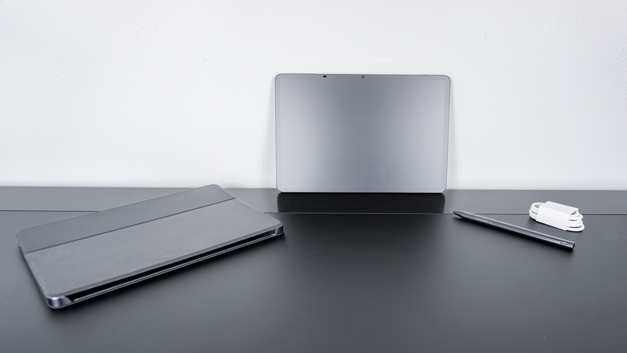 The TCL NXTPAPER 11 Plus unboxed on a desk