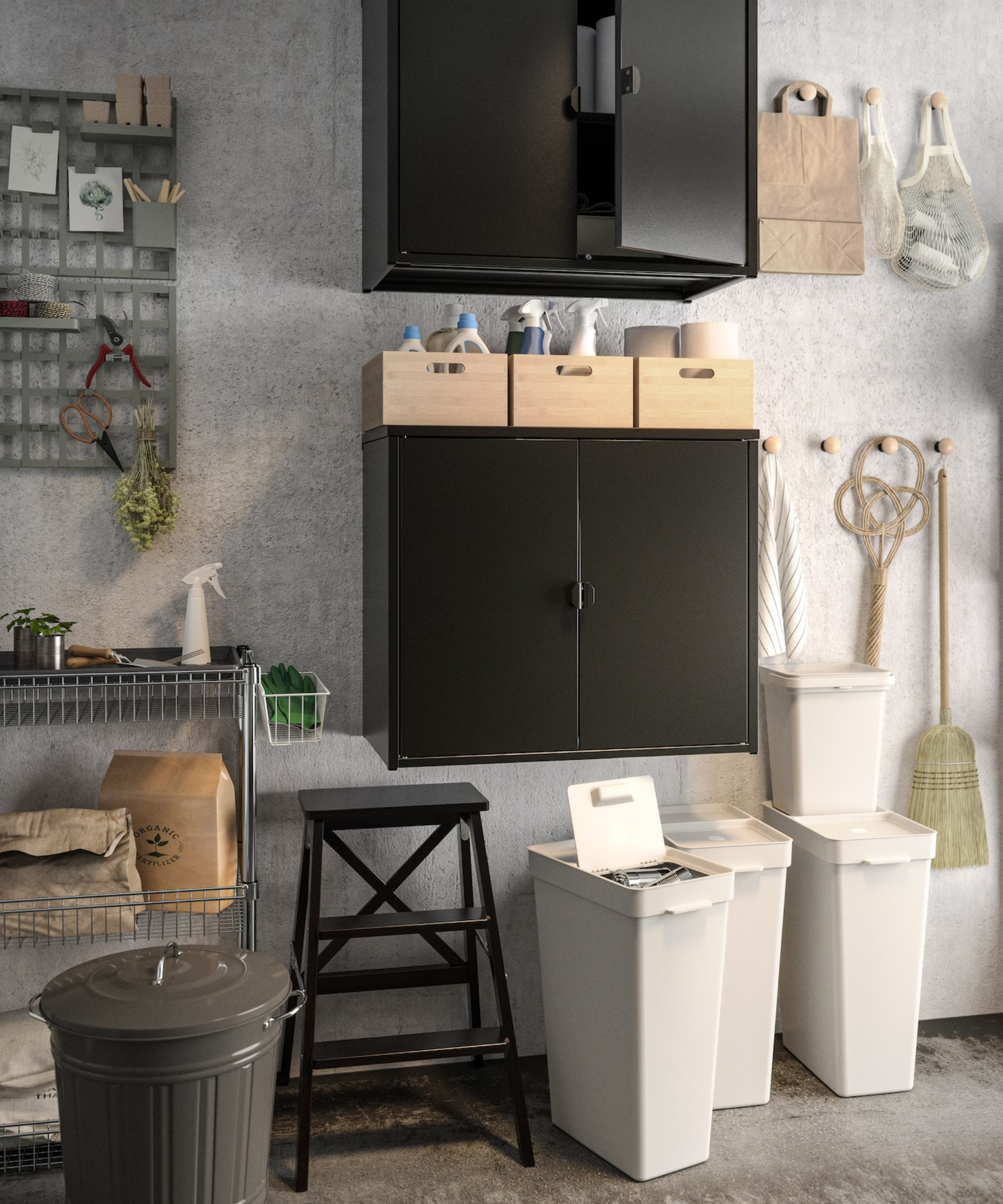 inside of garage with recycling tubs and various storage items