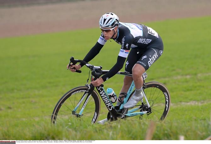 Niki Terpstra (Omega Pharma-Quickstep) rides through the fields of Flanders