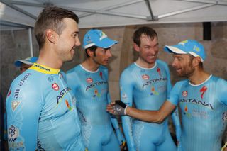 Michele Scarponi jokes with his Astana teammates after their win