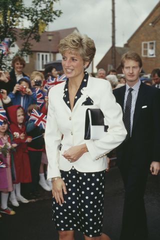 Diana, Princess of Wales (1961 - 1997) visit the Marlow Health Centre in Marlow, Buckinghamshire, UK, June 1991. She is wearing a suit by Paul Costelloe. (Photo by Jayne Fincher/Princess Diana Archive/Getty Images)
