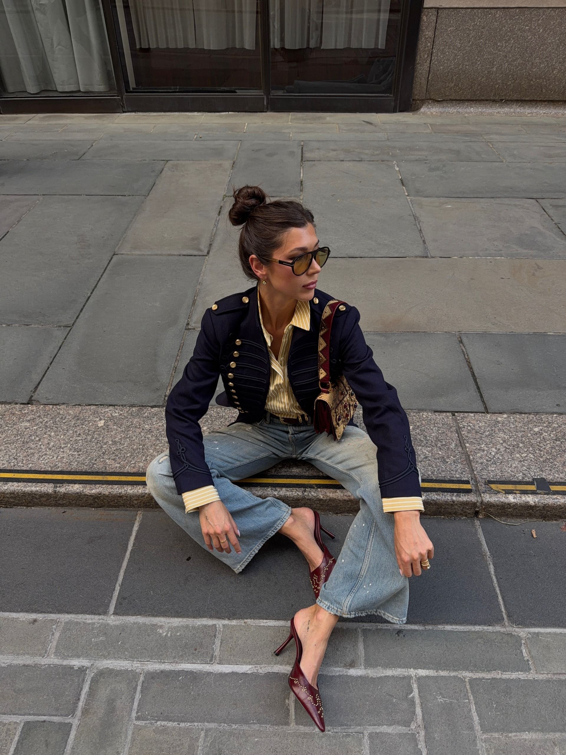Woman wearing a band-jacket outfit in 2026.