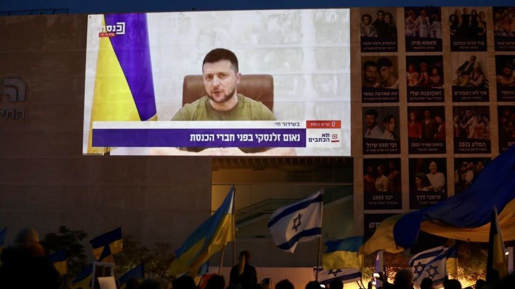 Ukrainian President Volodymyr Zelensky addresses Israeli lawmakers.