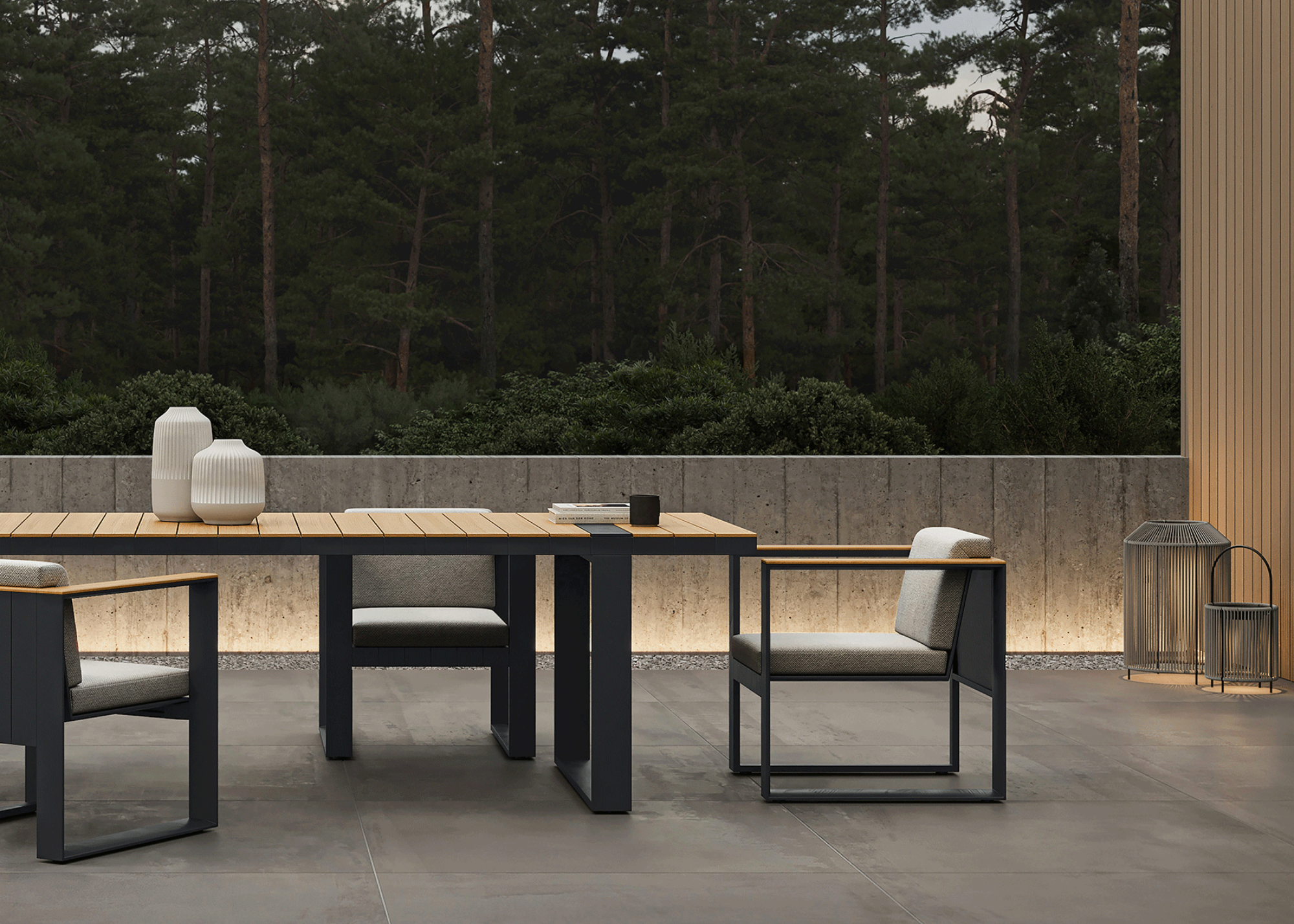sleek elegant outdoor furniture on a concrete patio in the forest