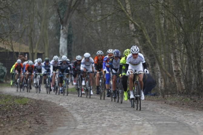 World Champion, Marianne Vos (Rabo Women) leads the peloton on the cobbles