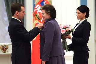 Valentina Tereshkova smiles as she meets Dmitry Medvedev.