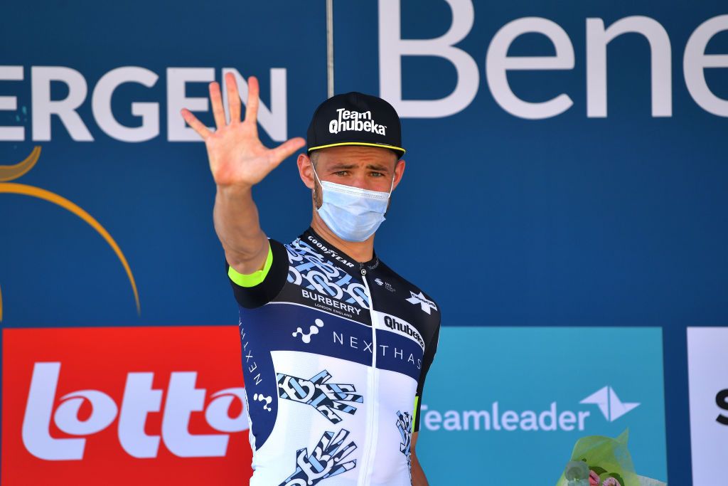 GERAARDSBERGEN BELGIUM SEPTEMBER 05 Victor Campenaerts of Belgium and Team Qhubeka Nexthash celebrates winning the third place on the podium ceremony after the 17th Benelux Tour 2021 Stage 7 a 1809km stage from Namur to Geraardsbergen BeneluxTour on September 05 2021 in Geraardsbergen Belgium Photo by Luc ClaessenGetty Images