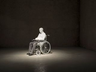 Old man sitting in wheel chair