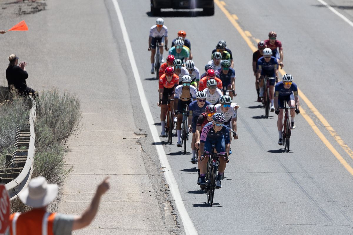 A gruppetto of dropped riders makes the left hand turn onto NM 356 at 68.2 miles