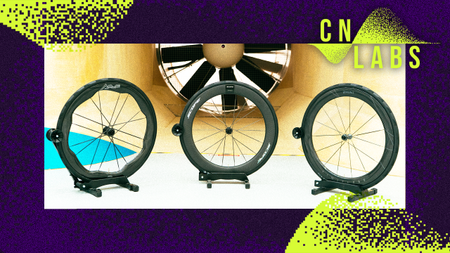 Road wheels in a wind tunnel, with a Cyclingnews Labs-themed border.