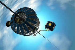 Electric-powered climber spacecraft rides up the space elevator.