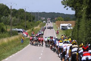 The Tour de France peloton was lined out on the country roads