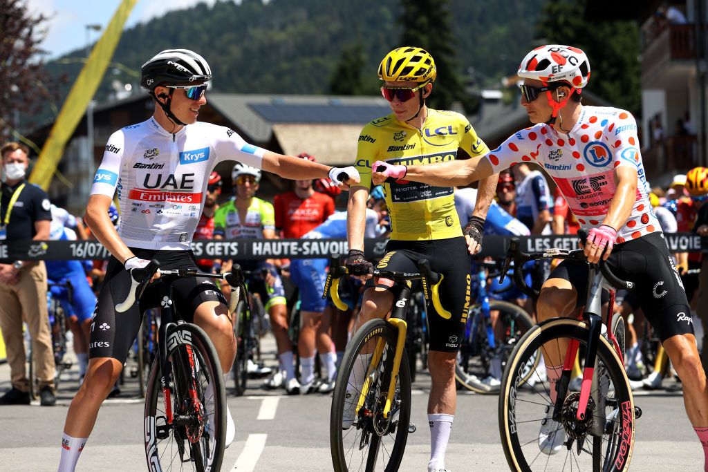 LES GETS LES PORTES DU SOLEIL FRANCE JULY 16 LR Tadej Pogacar of Slovenia and UAE Team Emirates White Best Young Rider Jersey Jonas Vingegaard of Denmark and Team JumboVisma Yellow Leader Jersey and Neilson Powless of The United States and Team EF EducationEasyPost Polka Dot Mountain Jersey prior to the stage fifteen of the 110th Tour de France 2023 a 179km stage from Les Gets les Portes du Soleil to SaintGervais MontBlanc 1379m UCIWT on July 16 2023 in Les Gets les Portes du Soleil France Photo by Michael SteeleGetty Images