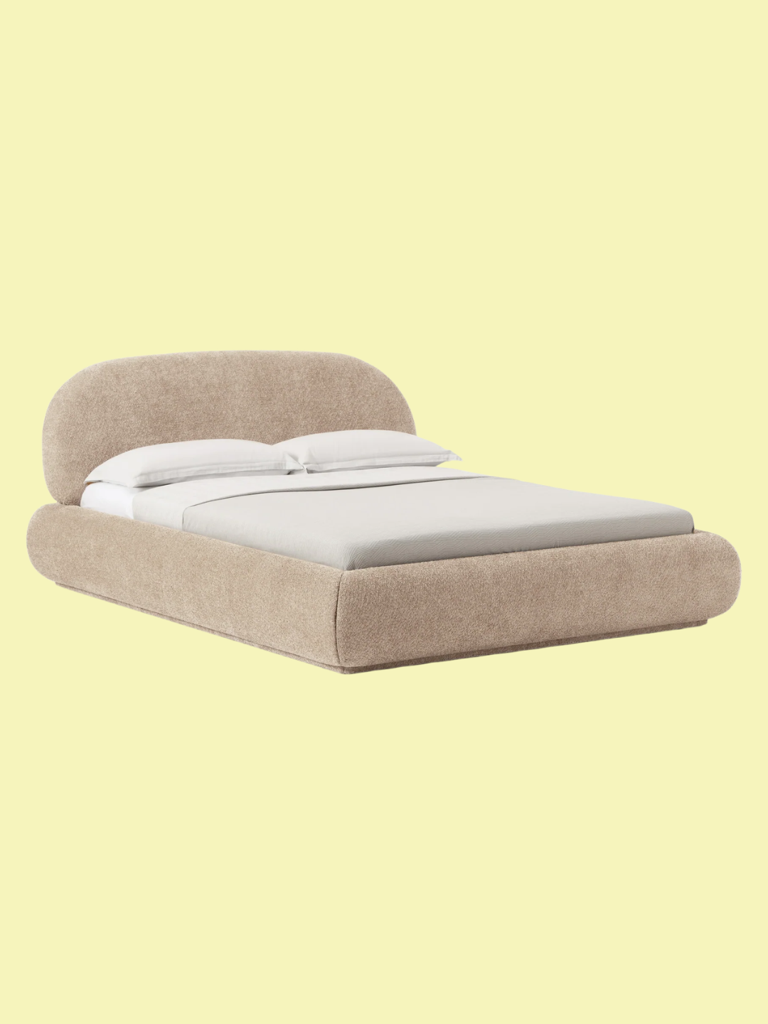 A curved boucle bed with a curved headboard from Westwing