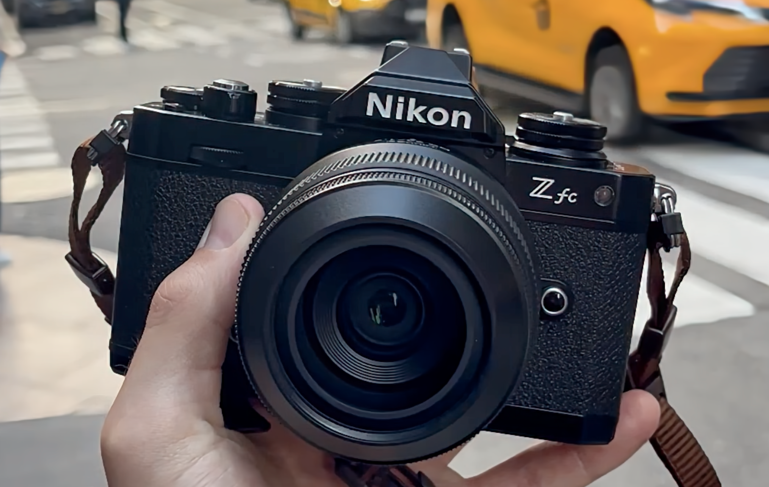 Mike Harris holding Nikon Zfc Black on New York streets