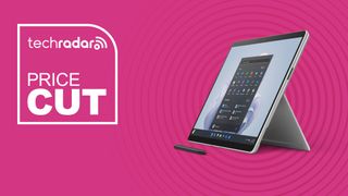 Microsoft Surface Pro 11th edition tablet in silver on pink background with price cut sign